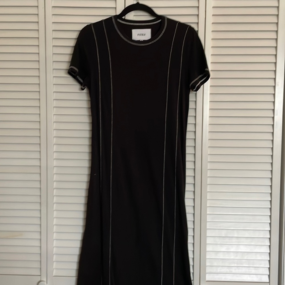 Pistola maxi dress; high slit on left side; comfy; can be dressed up or down.